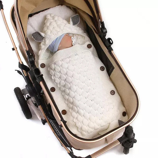 TROPELA Newborn Swaddle Sleeping Bag™
